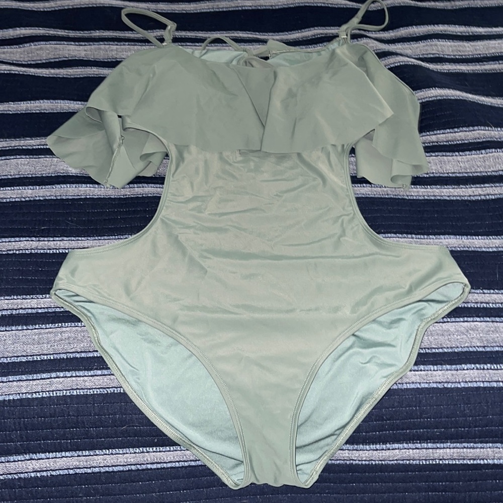 aerie dark green cutout one piece swim suit with ruffles that cover arms